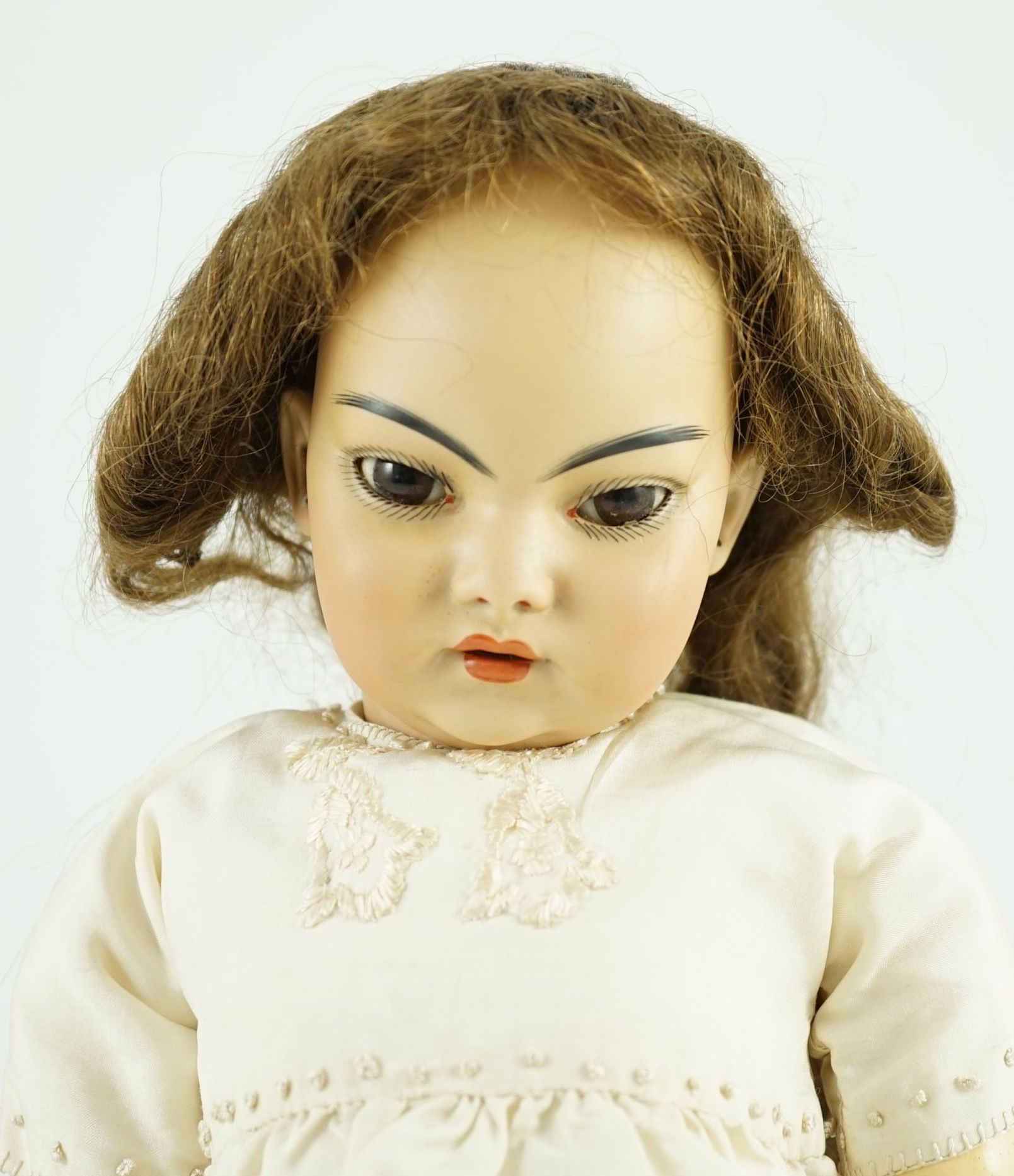 A Simon & Halbig bisque Oriental doll, 1099, height 46cm